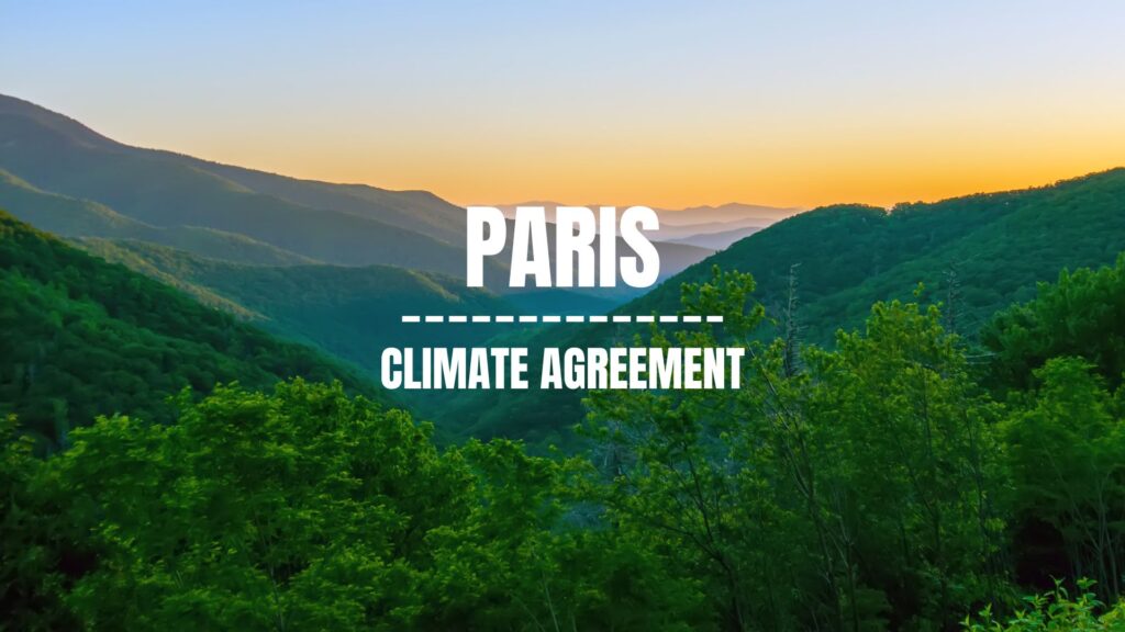 An Image of Mountains with greenery with text "Paris Climate Agreement".